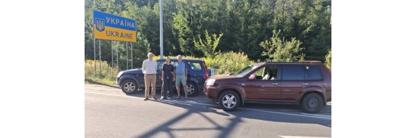 Aug26_Cars-people-flags_A-Medium.jpeg